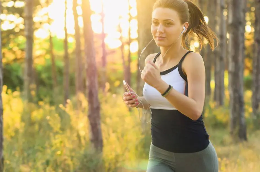 Woman jogging outdoors, energetic and in motion